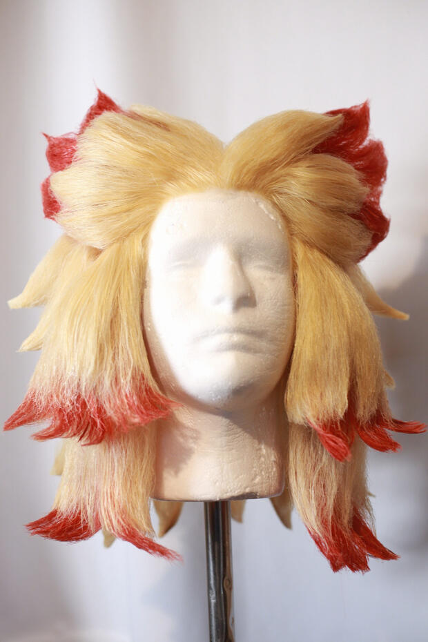 lace front blonde and red cosplay wig styled to look like rengoku from demon slayer